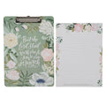 Floral clipboard with matching notepad on a white background
