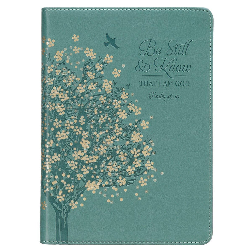 Teal notebook journal with floral design and inspirational Bible quote on a white background