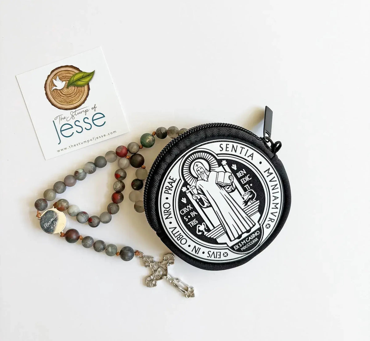 St. Benedict Medal Rosary Pouch with a black and white circular case on a white background