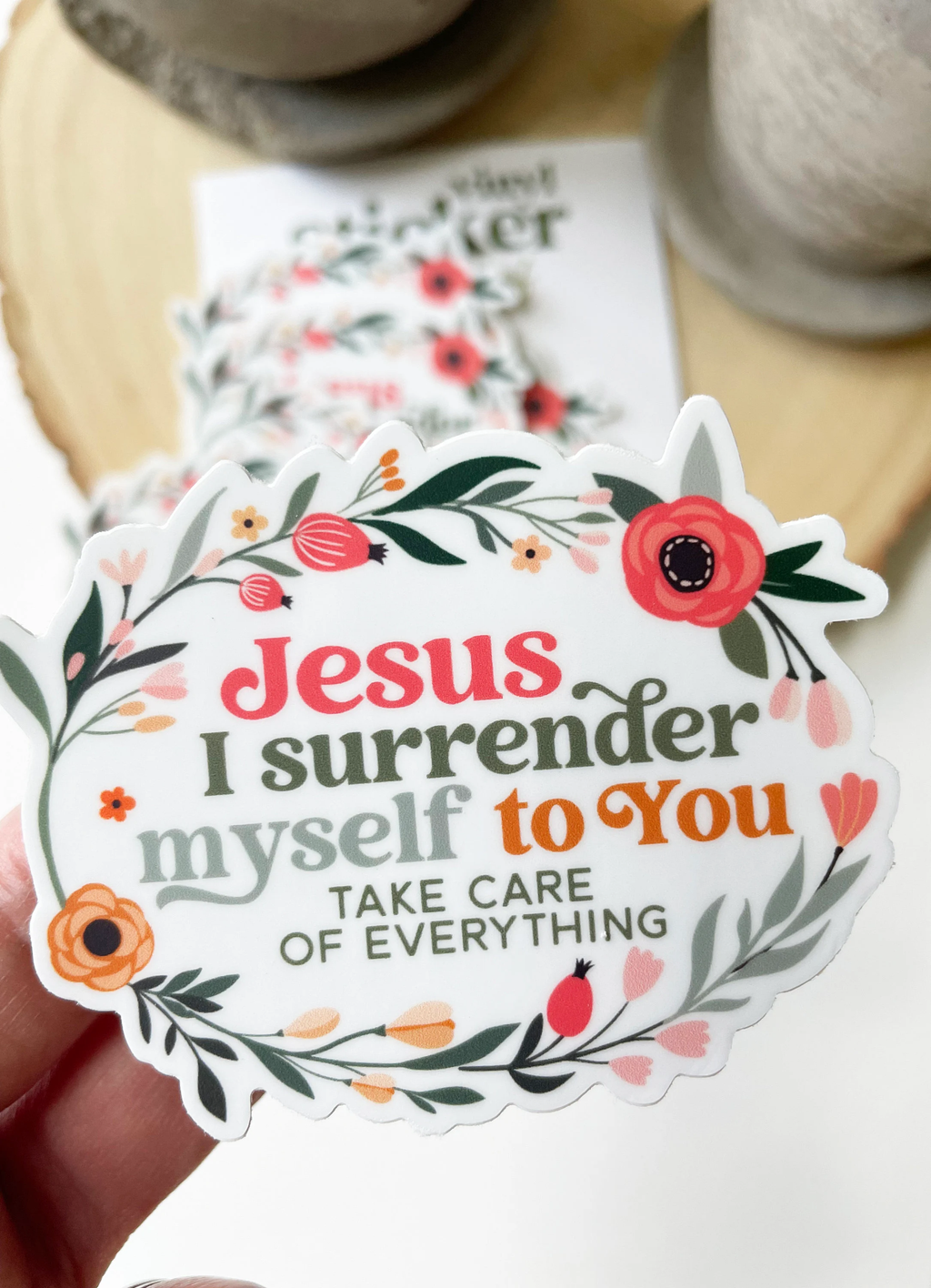 Decorative sticker with floral design and text Jesus I surrender myself to you take care of everything on a white background