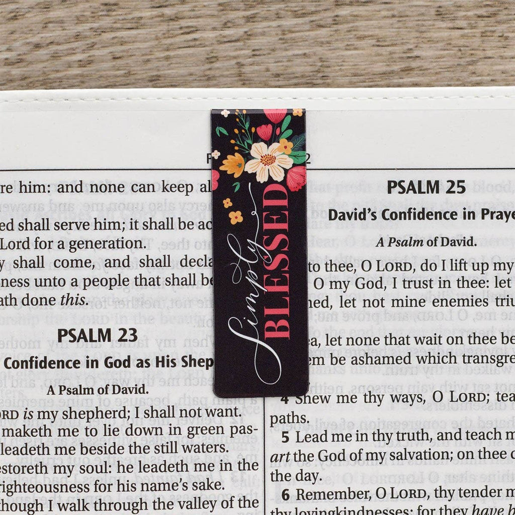 Floral 'Simply Blessed' bookmark on a Bible page